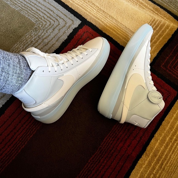 Nike Shoes - Nike High-Top Sneakers in White and Light Gray